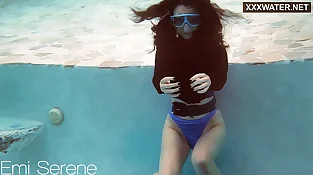 French damsel Emi Serene swimming bare